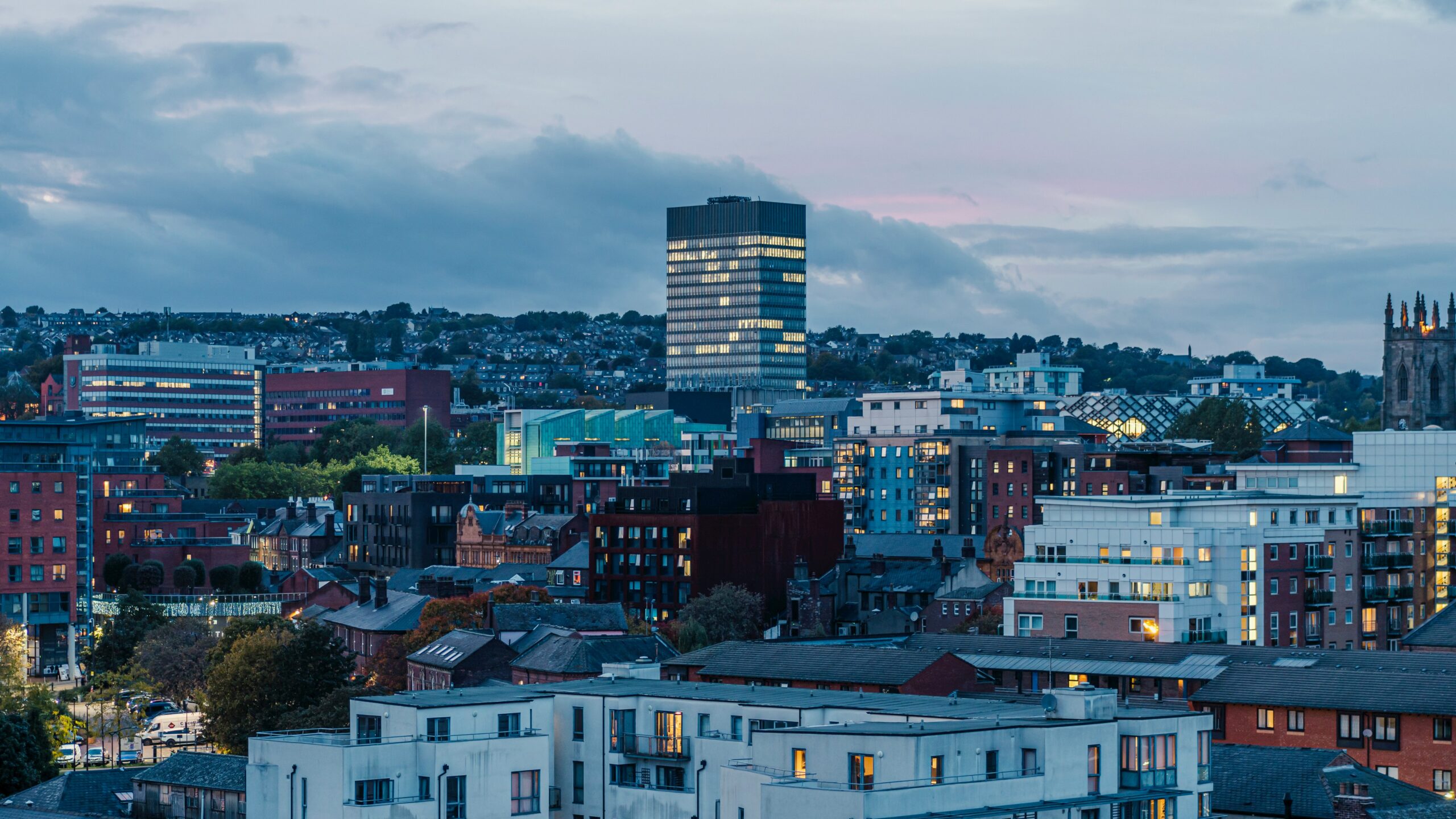 The Sheffield city skyline at dusk, showing the arts tower in the distance.