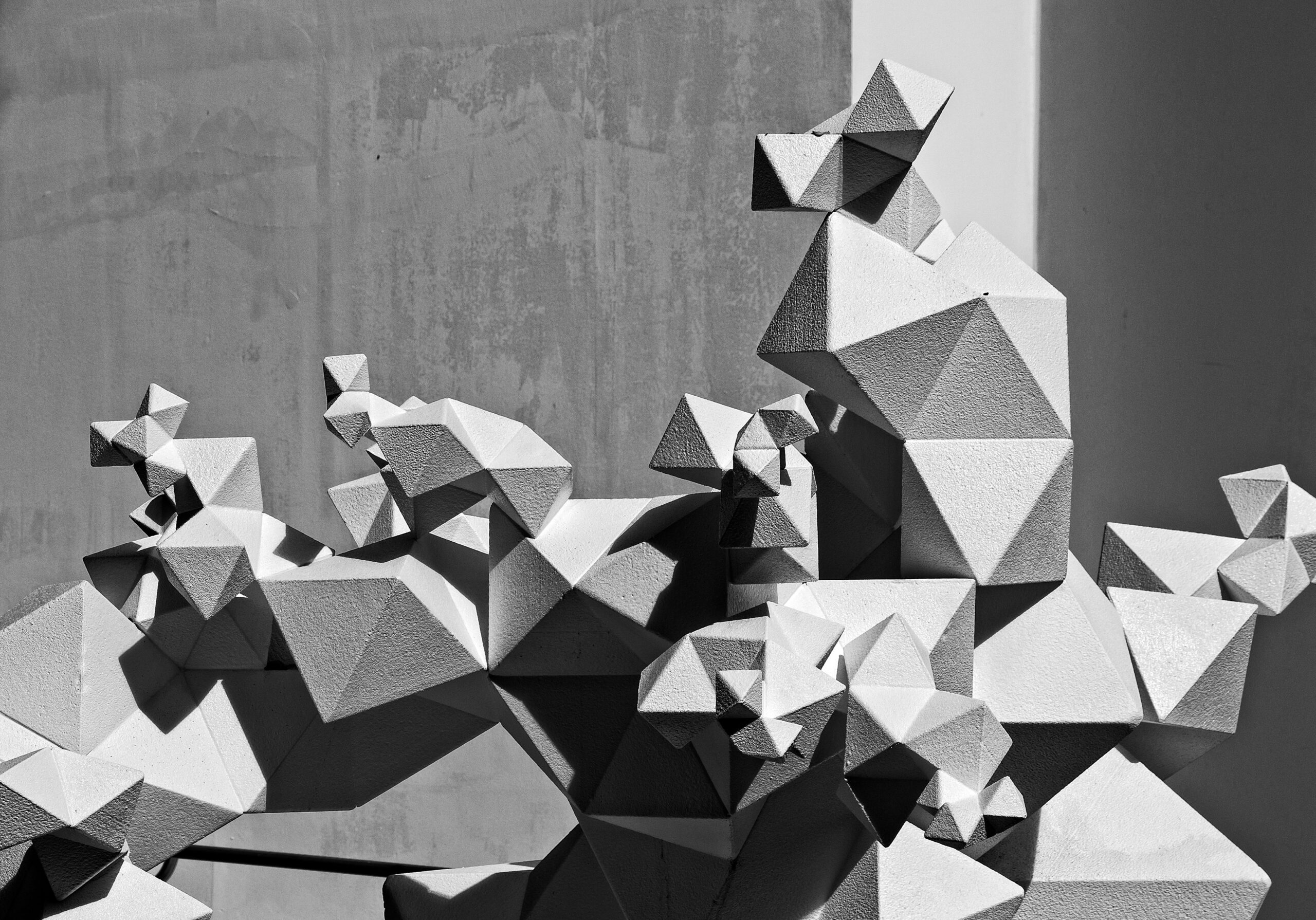 Abstract polygons in different shades of grey create an interesting sculpture